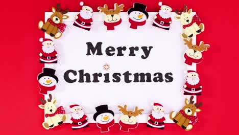 christmas stickers appear on frame with merry christmas text. stop motion