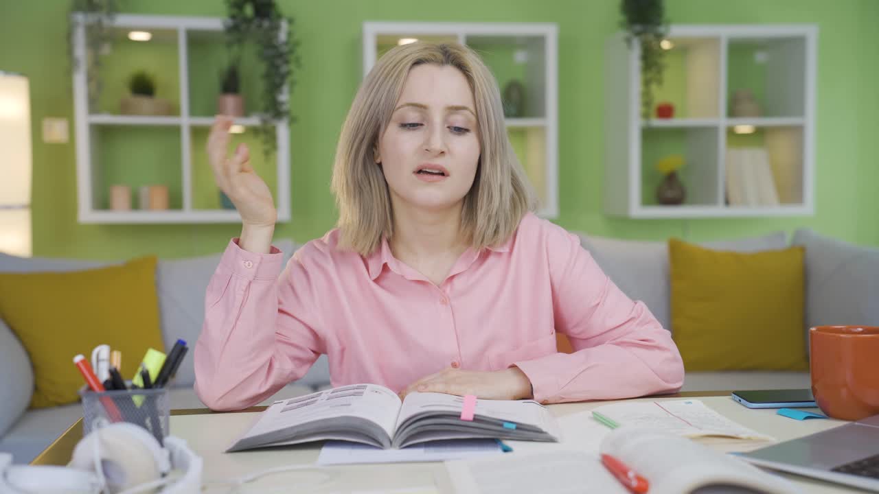 Girl with excessive homework does not want to study.