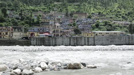 himalaya mountainous river ganges flowing through himalaya villages - cities in uttarakhand, india