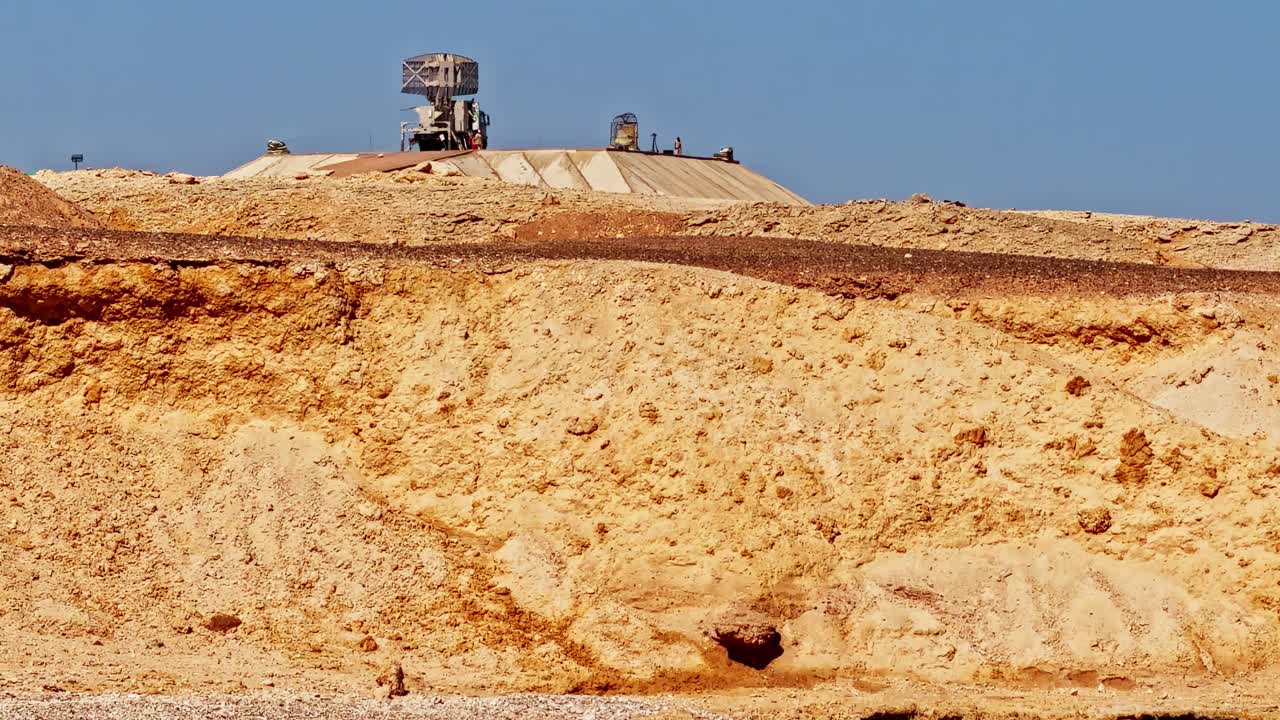 Clear turquoise water surface near Egyptian coastline, sunny tropical sea background, woman snorkeling