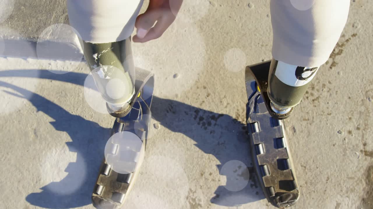 animación de puntos de luz sobre una mujer afroamericana discapacitada con piernas artificiales