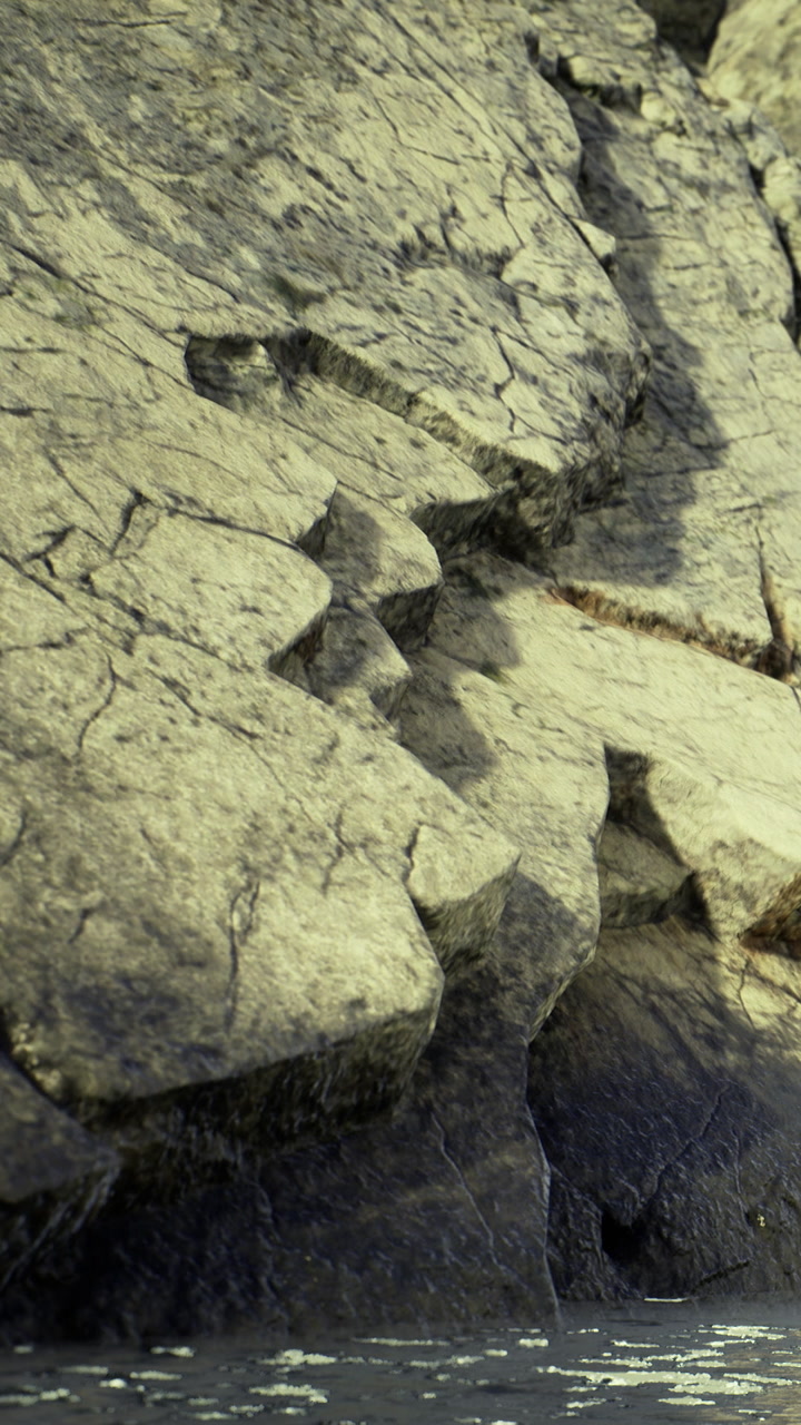 Rock formation by the sea during daytime near a coastal area with clear water