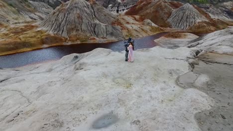 couple in a quarry landscape