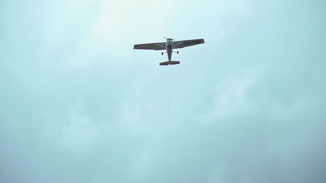 Avionet flight. Airplane down view. Airplane crossing skyes. Personal flight.Avionet, running with proppelers