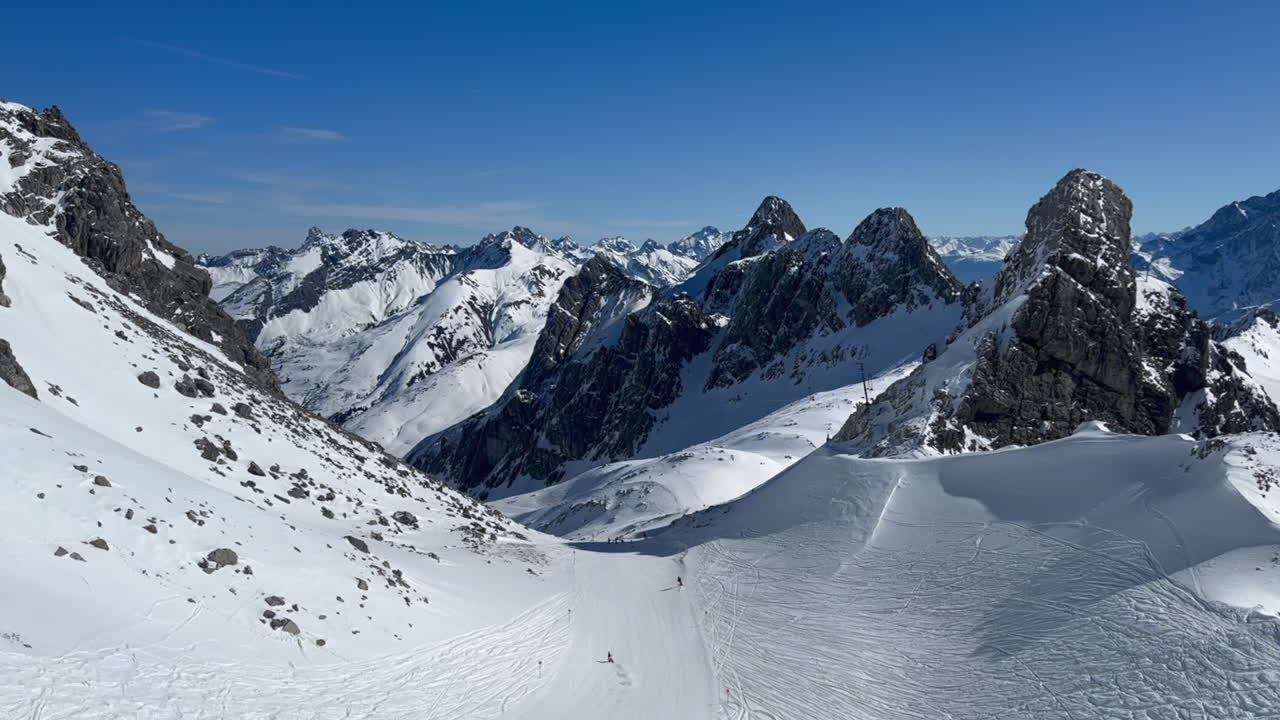 High angle view of sunny ski slope in high Tyrol mountains of Austria