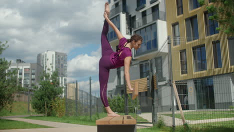 woman stretching in urban park