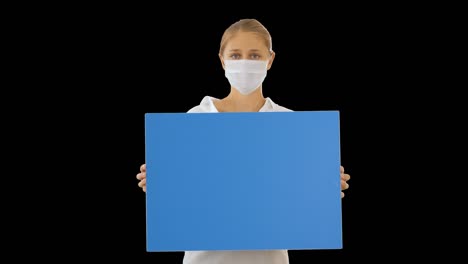 beautiful businesswoman in protection mask holding blank board, alpha channel