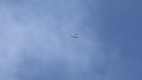 bi-planes execute coordinated aerial maneuvers