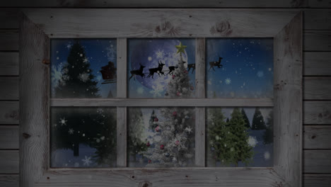 Wooden-window-frame-against-snowflakes-falling-over-christmas-tree-on-winter-landscape