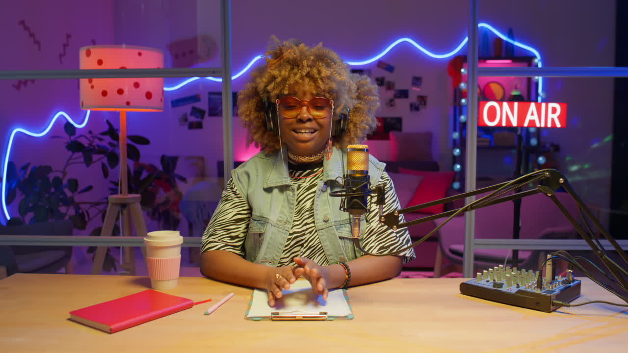 Woman podcast host in a radio studio