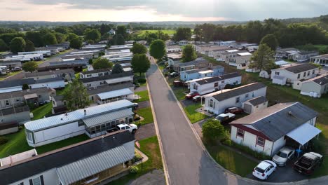 summer storm rolls in at rural american mobile home trailer park