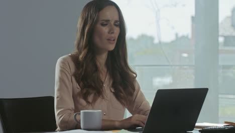 Business-woman-finishing-work.-Closeup-portrait-of-tired-lady-closing-computer.