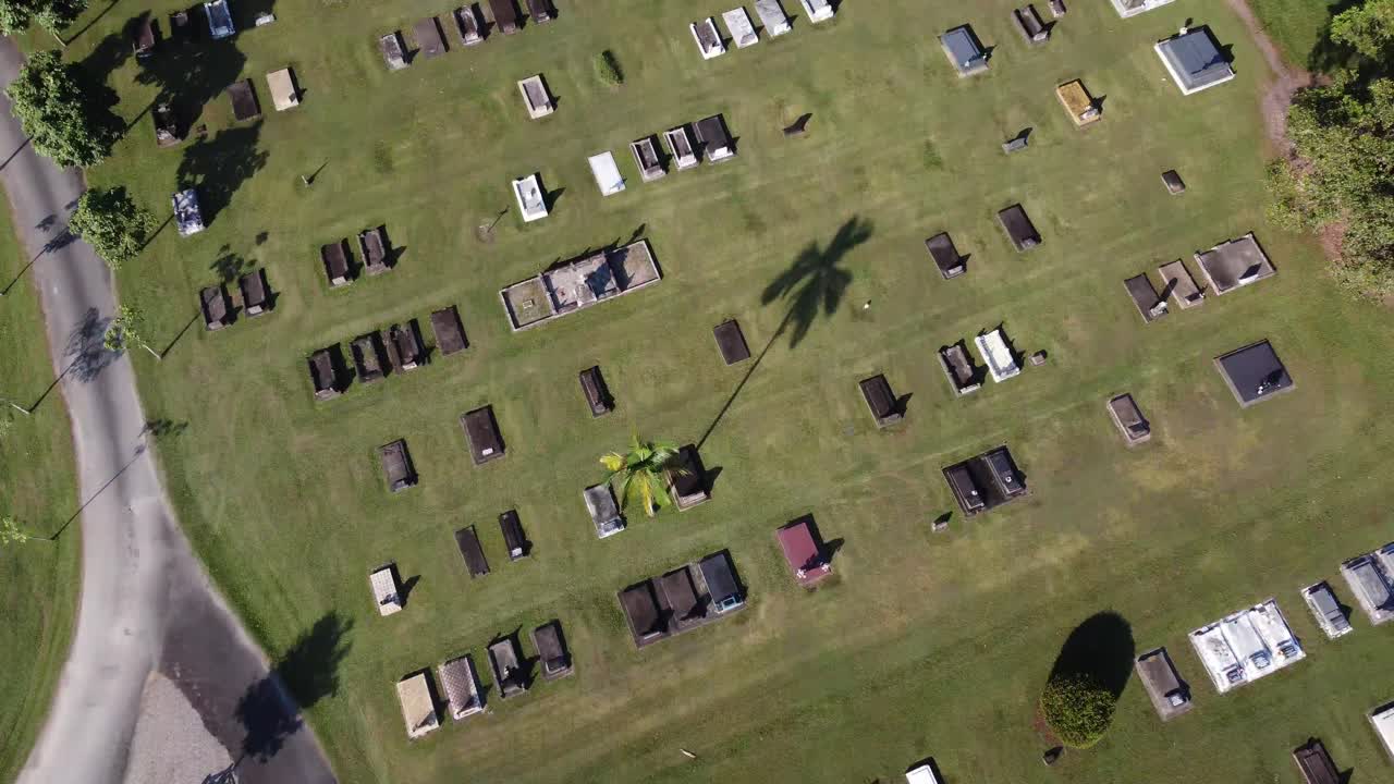 Drone flying over a very tidy cemetery in Mossman, North Queensland Australia