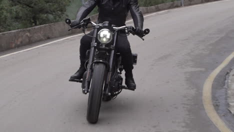 motorcyclist on a winding mountain road