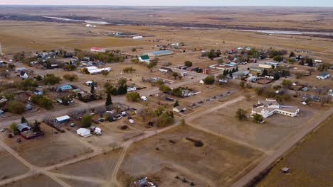 drone view over head of the town of empress alberta canada during the daytime in the prairies