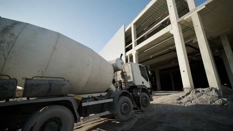 the concrete mixer at the industrial plant. builders are building a factory, hangar.