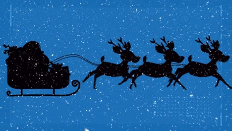 Snow-falling-over-silhouette-of-santa-claus-in-sleigh-being-pulled-by-reindeers-on-blue-background