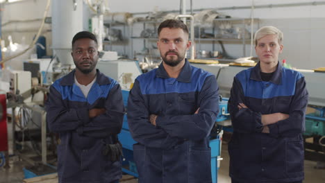 plant workers posing for camera