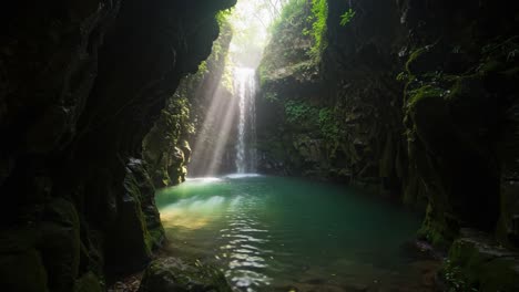 a majestic waterfall cascades into a serene pool surrounded by lush greenery, illuminated by glimmers of sunlight filtering through the mountains above