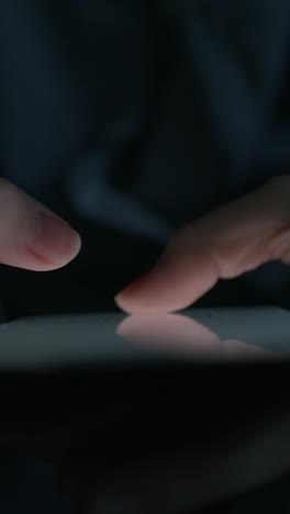 person using a smartphone at night