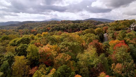 aerial-pullout-in-fall-with-grandfather-mountain-in-background-with-autumn-leaves-near-boone-nc,-north-carolina