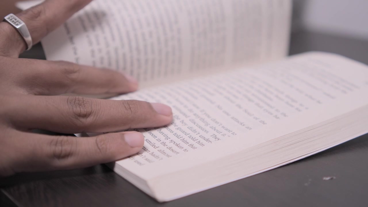 Flipping the Pages of a Novel.