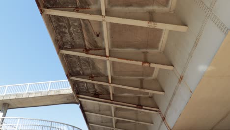 construction of a metal bridge with rusty places at the joints caused by rain and moisture