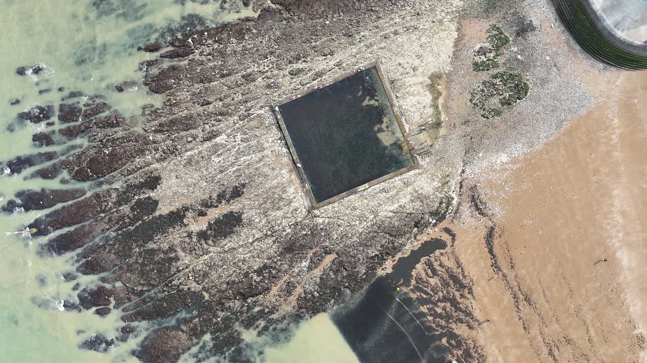 Overhead birds eye drone aerial view tidal pool Broadstairs Kent UK
