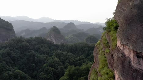 dramatic chinese mountain formation, bajiao shan mountain valley, 4k aerial view