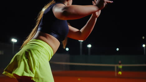 woman tennis player at night