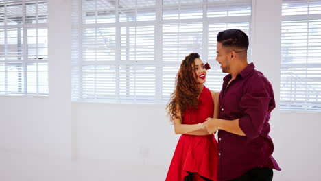 Ballroom,-dance-and-couple-learning-the-salsa