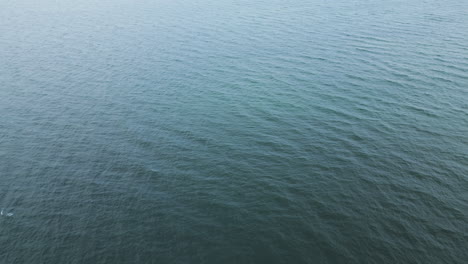 Calmness-Of-A-Seascape-During-Sunset.-Aerial-Shot