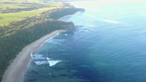 aerial footage at dusk of rugged coastline near inverloch, victoria, australia