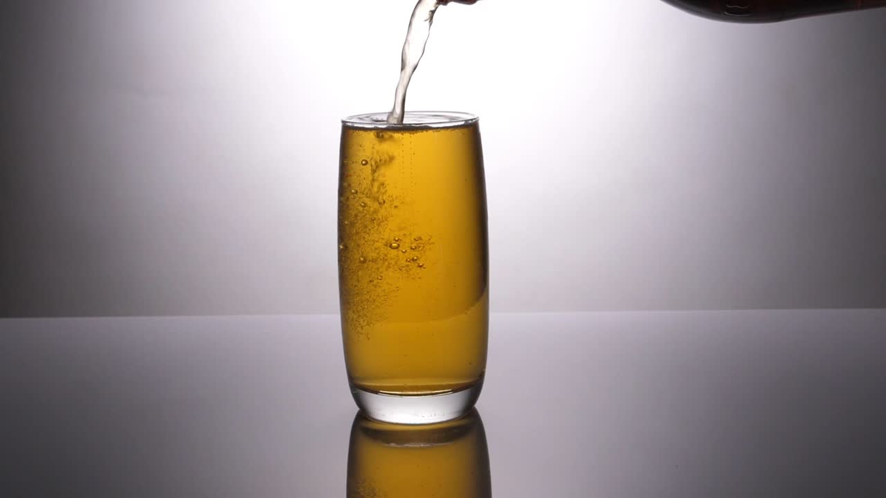 Pouring Beer Into A Glass , Slow Motion
