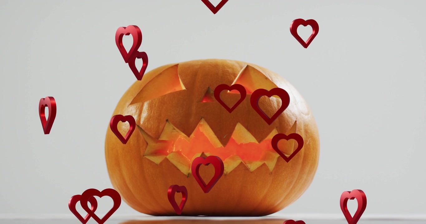 Piccoli cuori rossi 3D che entrano dall'alto e dai lati, fluttuando e circondando una zucca intagliata per amore.