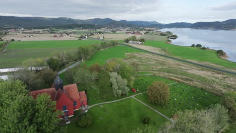 aerial view of rissa church near leira village in indre fosen, trøndelag county, norway