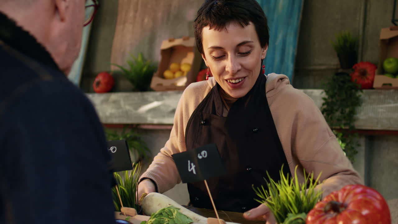 People shopping for produce at a farmer's market
