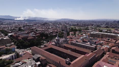 Aerial-view-orbiting-the-Santuario-Nuestra-Señora-del-Carmen,-in-Bogota,-Colombia