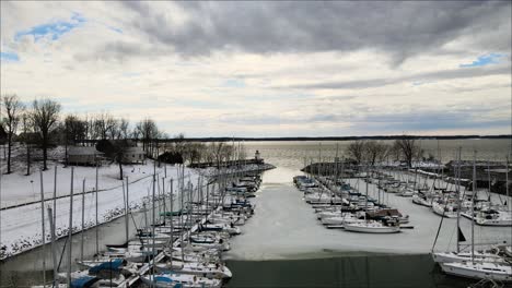 reveal of the frozen boats in the marina at lighthouse landing in grand rivers, kentucky