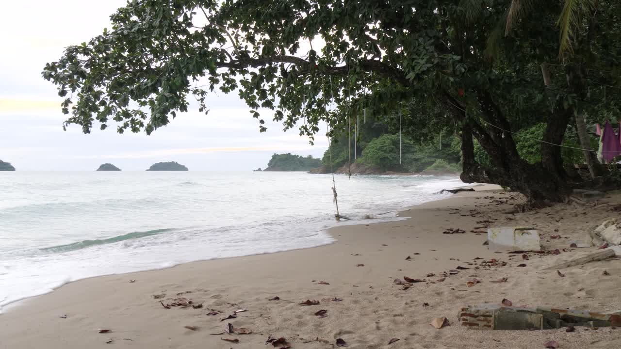Calm, deserted beach with serene waves at Lonely Beach, Koh Chang