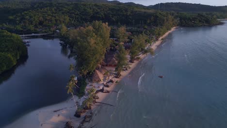 beach bar on spit of land at sunset