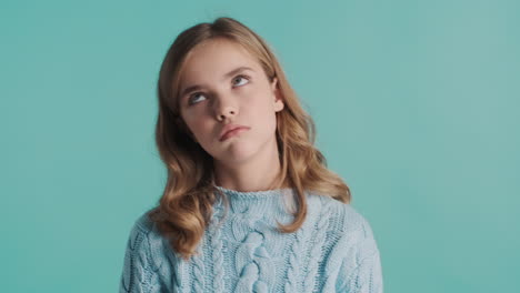 Teenage-Caucasian-girl-looking-bored-in-front-of-the-camera.