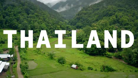 drone shot of terraced rice paddy fields overlaid with animated graphic spelling out thailand