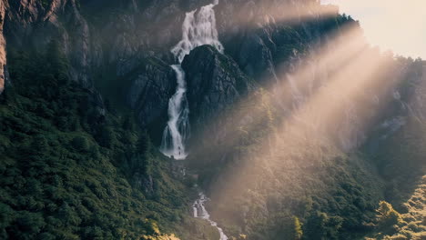 majestic waterfall cascading down mountainous terrain