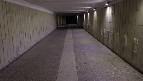 walking in the underground passage in the night