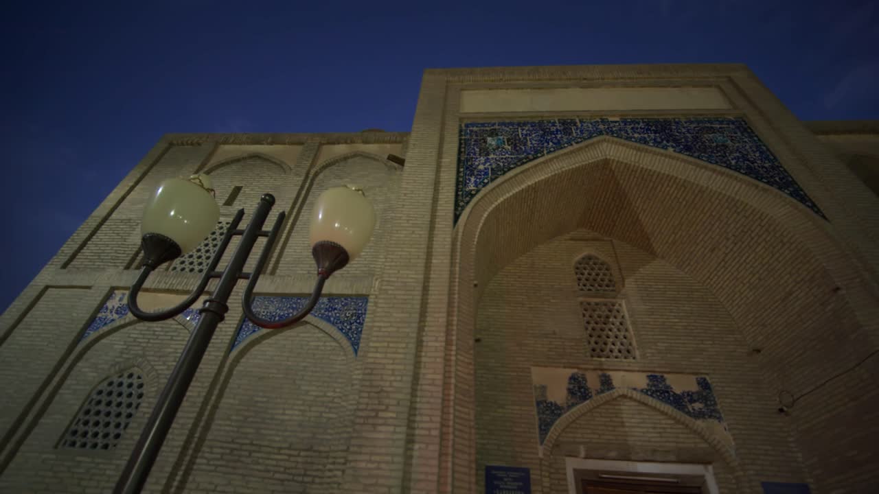 Bukhara old city night time Minaret near Mosque Khoja Kalon 16th century Uzbekistan Silk road sunset