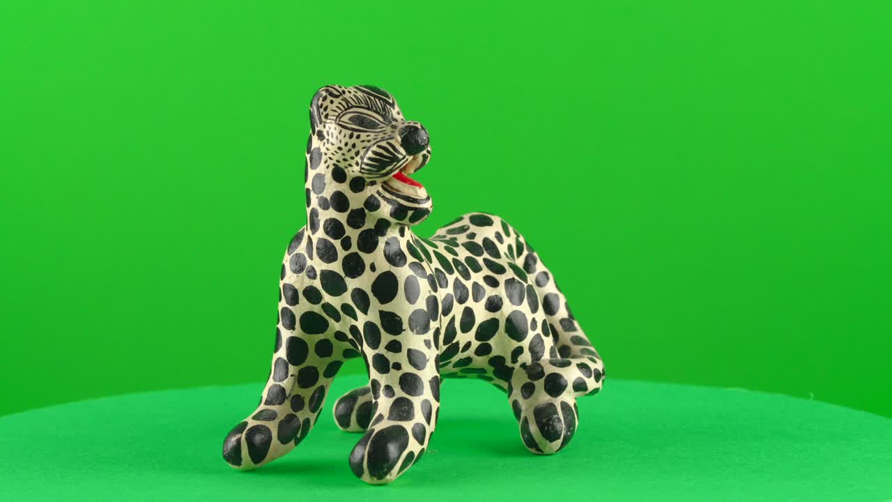 Mexican latin jaguar god stand up maya aztec culture symbol deity on green background chroma key background replacement backdrop objet in a turntable 3d spinning loop