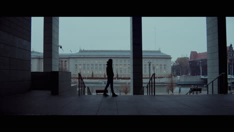 person walking in a city