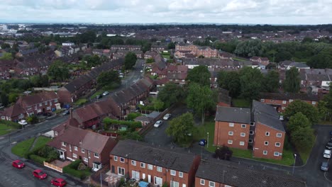 suburban neighbourhood residential english housing estate homes aerial view panning right