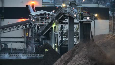 midnight industry: a look at the conveyor belt system in action at a plywood production facility